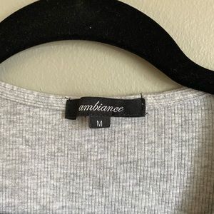 Tie criss crossed short sleeve shorts.